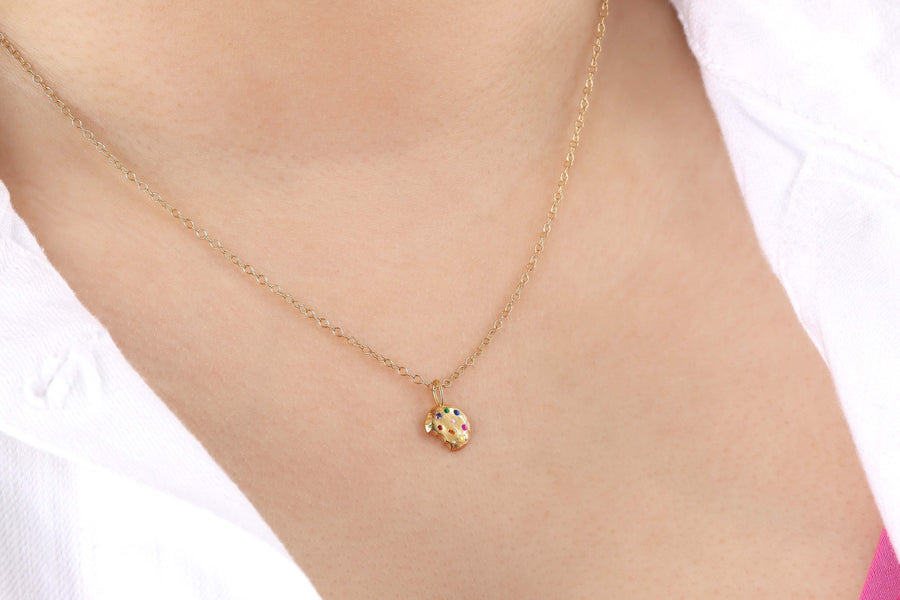 Birthday-Cookie-14kVermeil-Necklace-model-sideview-bite