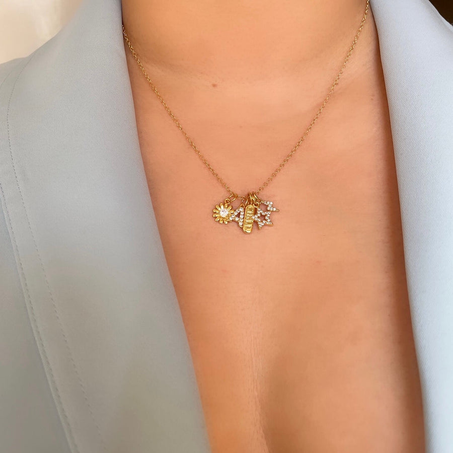 Ale Weston Fiesta Charms Gold Daisy CZ Charm, Letter CZ Charm, Chill Pill Charm, Star CZ Pave Charm, Lightning Bolt Charm, 14k Gold Filled Cable Chain. 
