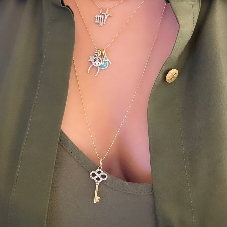 Model Wearing Ale Weston 14k Gold Forever Key Diamond Charm with Gold Ball Chain Necklace