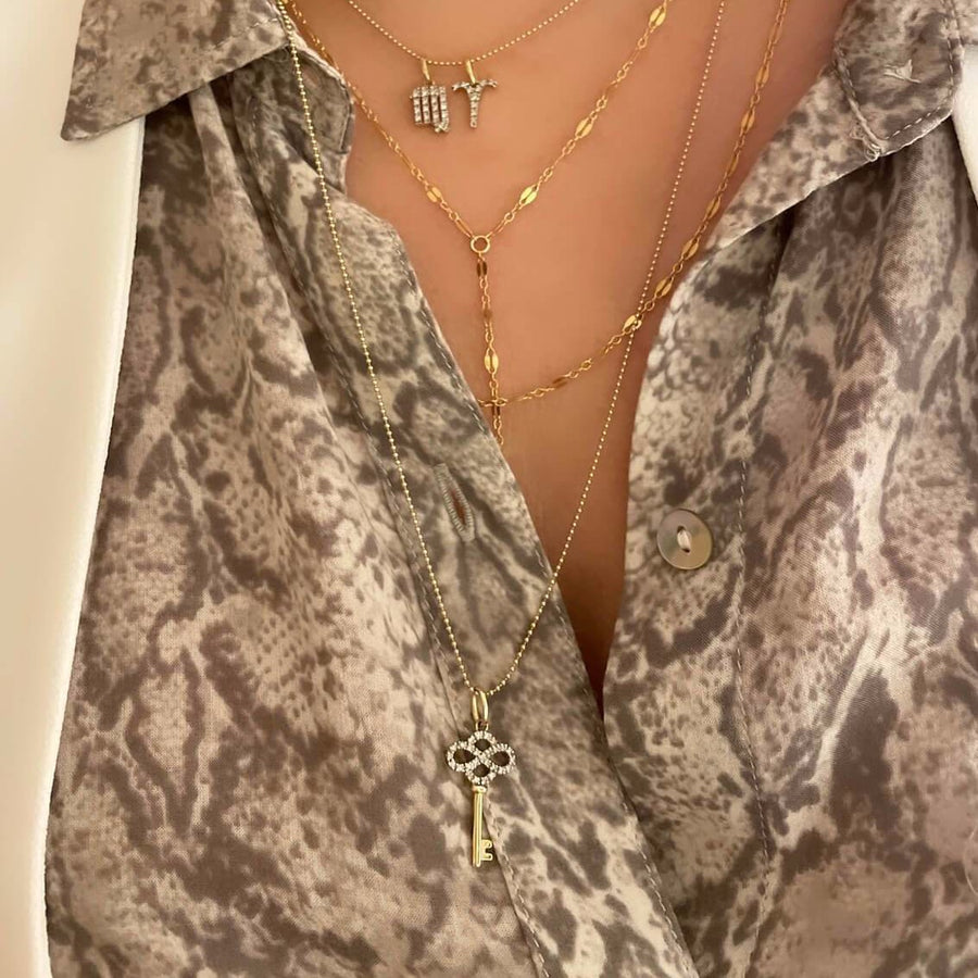 Model Wearing Ale Weston 14k Gold Forever Key Diamond Charm with 24" ball chain