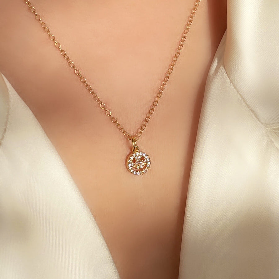 Close Up Of Model Wearing Ale Weston Happy Face CZ Pave Charm with Cable Chain Necklace