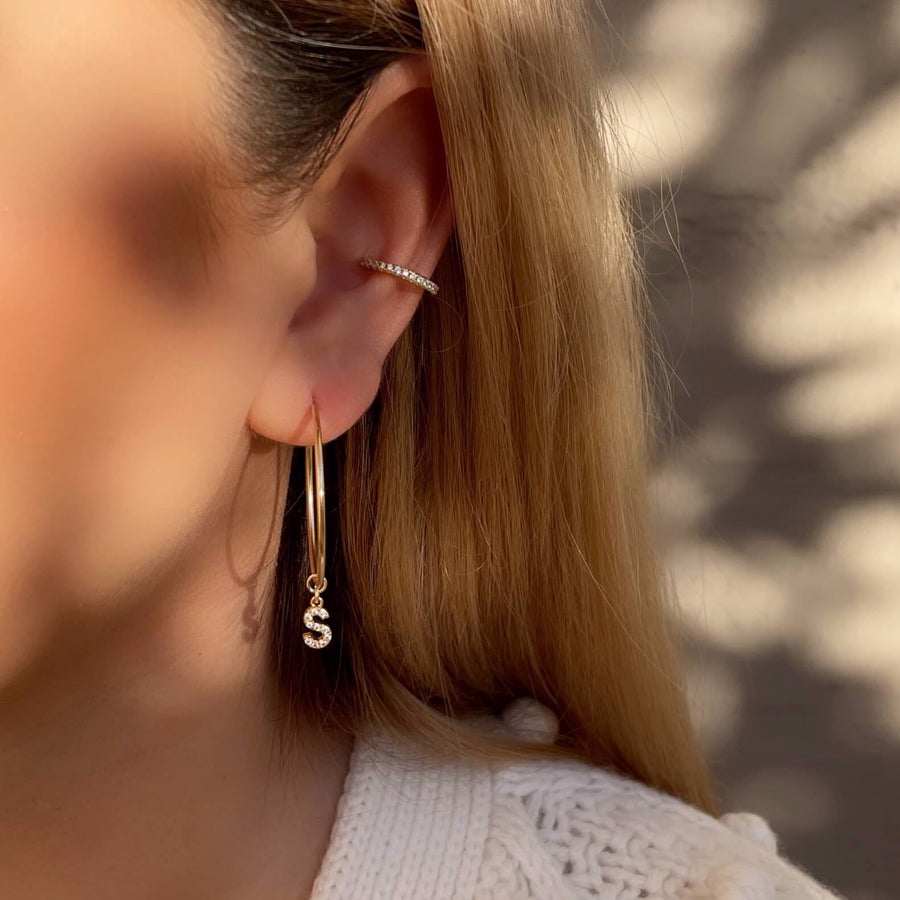 Model Wearing Eternity CZ Pave Ear Cuff with Design Your Own Hoop Earrings - Slide On Style featuring  Letter CZ Pave Charm (S) and Endless Hoop Earrings (30mm)
