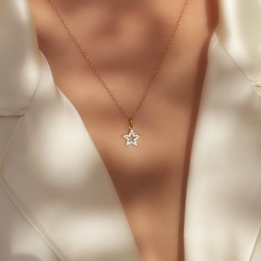 Model wearing Ale Weston Star CZ Pave Charm with cable necklace